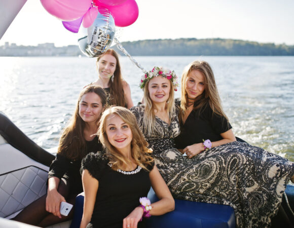 girls having fun yacht hen party